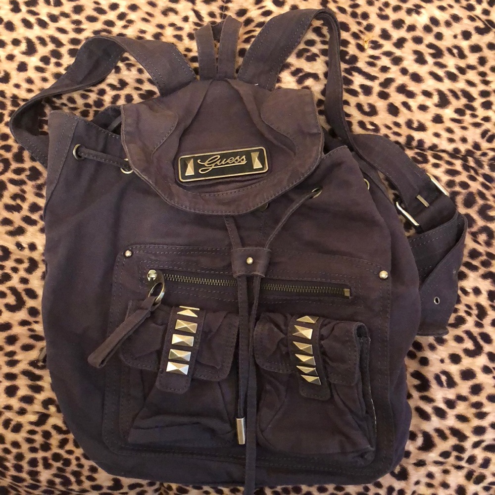 Woman’s blue Guess backpack